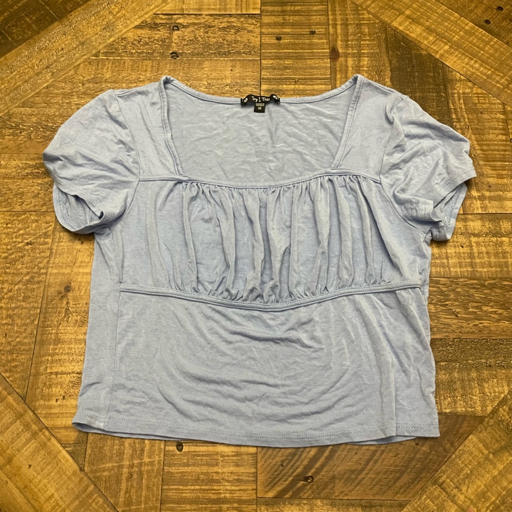 Try this light blue knit top with square neckline & gathered ruched bust detail
